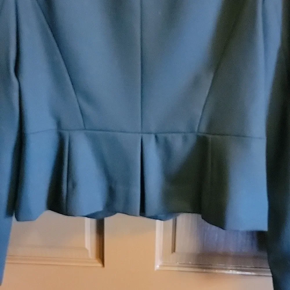 Loft-wool very light blk short blazer with peplum in back Size 12 NWT.
